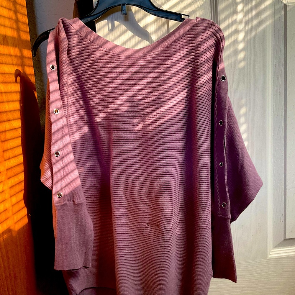 Lilac colored sweater with grommet detail